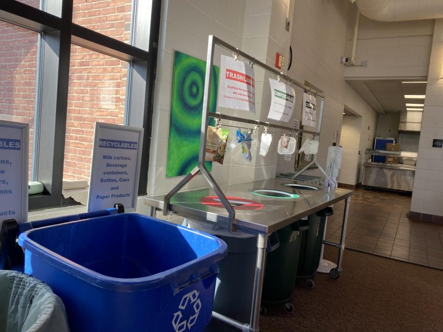 The current setup in the lunchroom contains a recycling bin, as well as one trash can, and two compost bins.