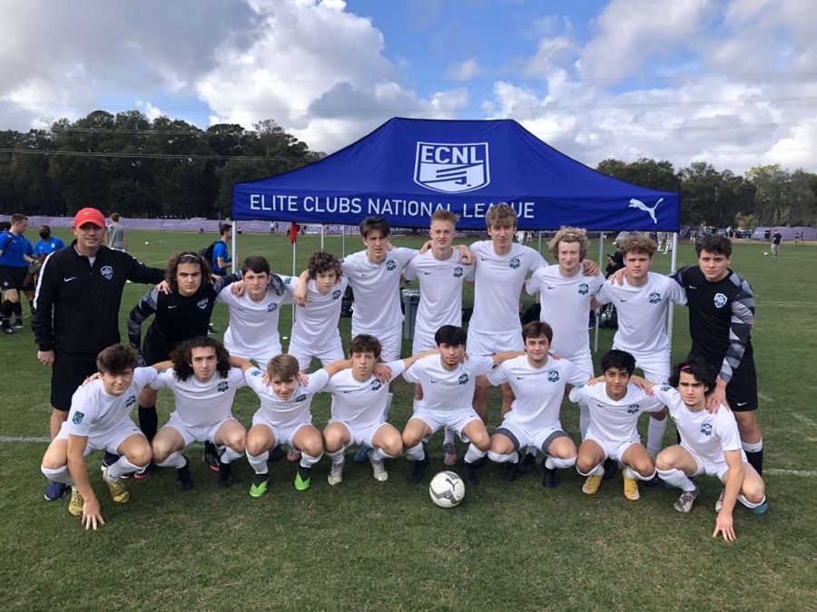 Junior Leo Larsen poses with his Minnesota Thunder Academy soccer team at a showcase in Florida. 