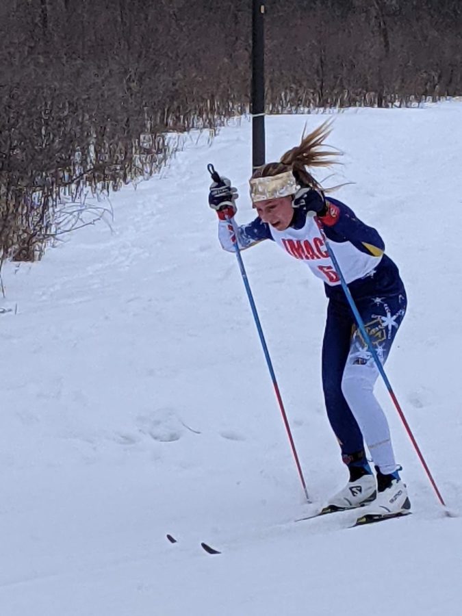 8th+grader+Igna+Wing+skis+during+the+section+tournament.