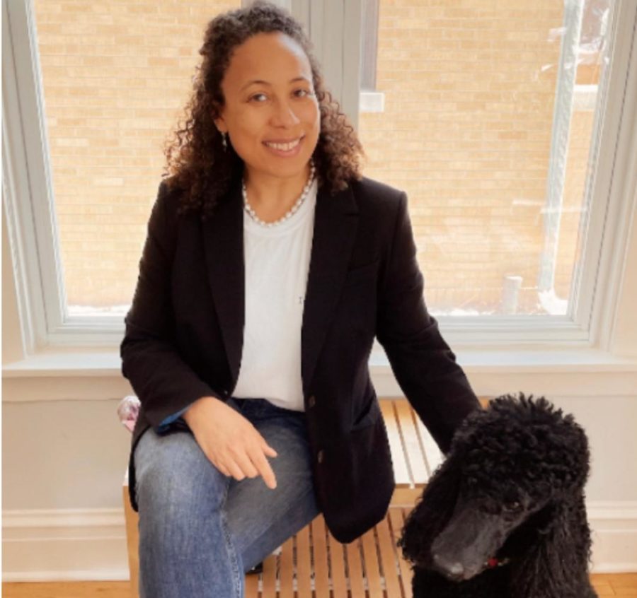 This is Collins channeling Kamala Harris on Inaguration Day. Collins 2 year old Standard Poodle, Otto, is sitting next to her. 