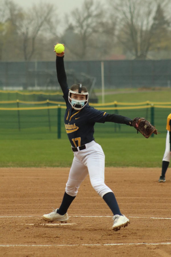 Senior Jane Christakos winds up for a pitch.