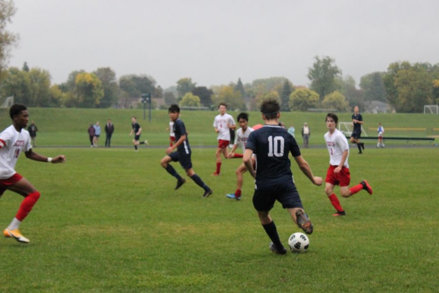 Junior Cooper Bollinger Danielson makes a perfect pass the sophomore Orion Kim. 