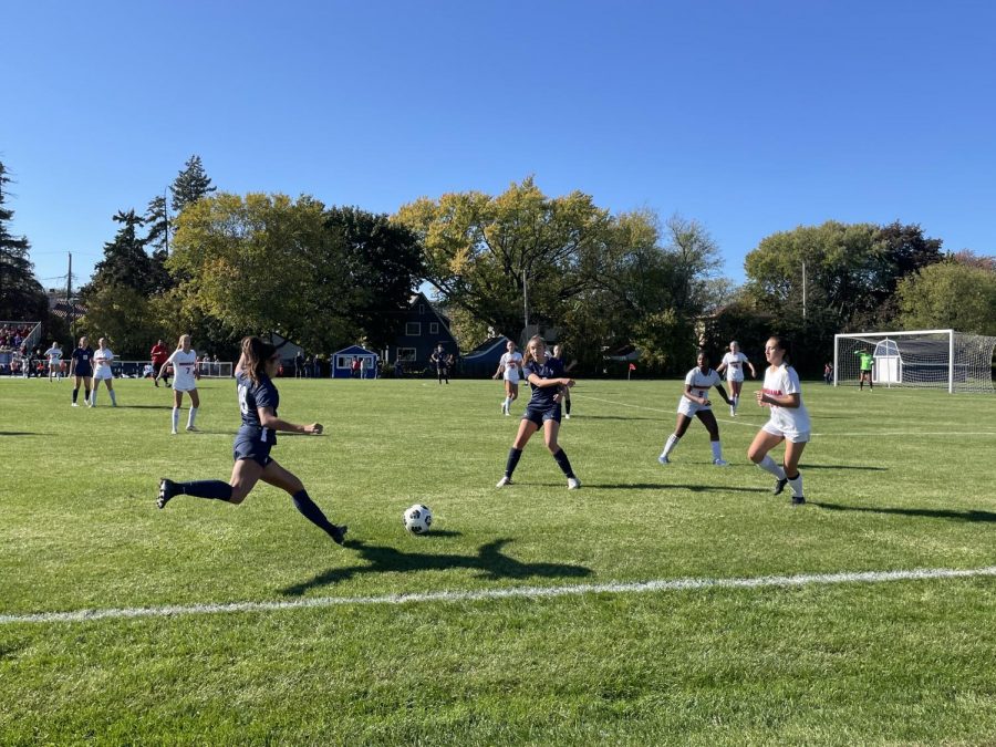 Defender Aurelia Meza prepares to send a ball into the box, hoping to inspire an offensive attack towards the goal. 