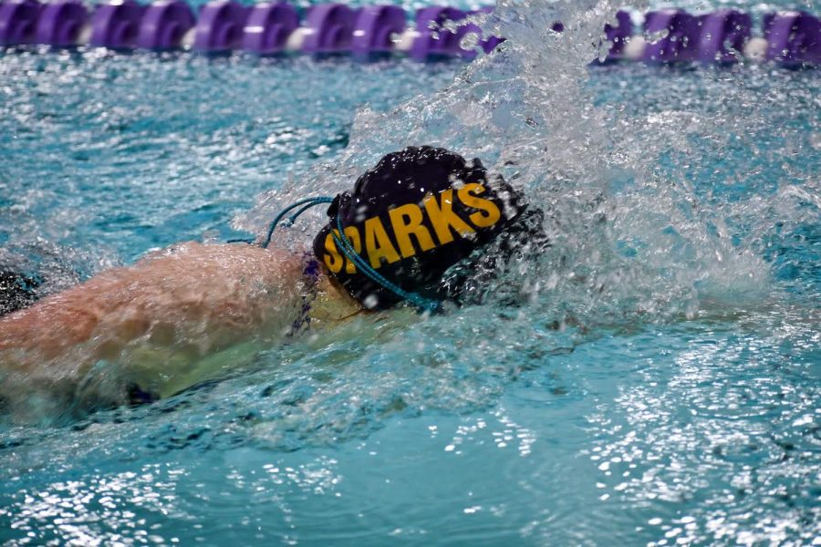 Senior Marie Schumacher swims her first inidividual event of the night which is the 200 freestyle.