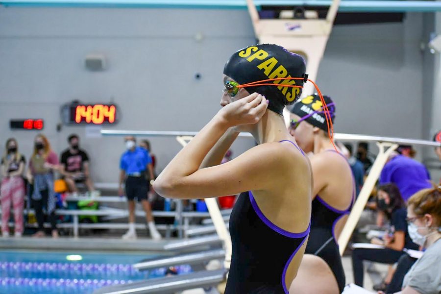 Senior Ellie Sandeen prepares to get on the blocks for her first individual event, the 200 IM.