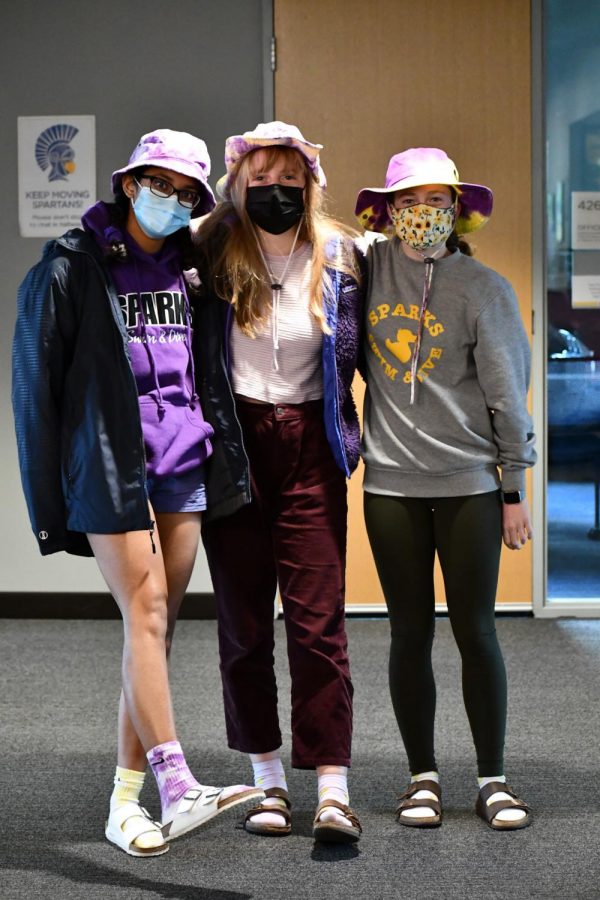 From head to toe, seniors Divya Bhargava, Eleanor Smith and Marie Schumacher purple out.