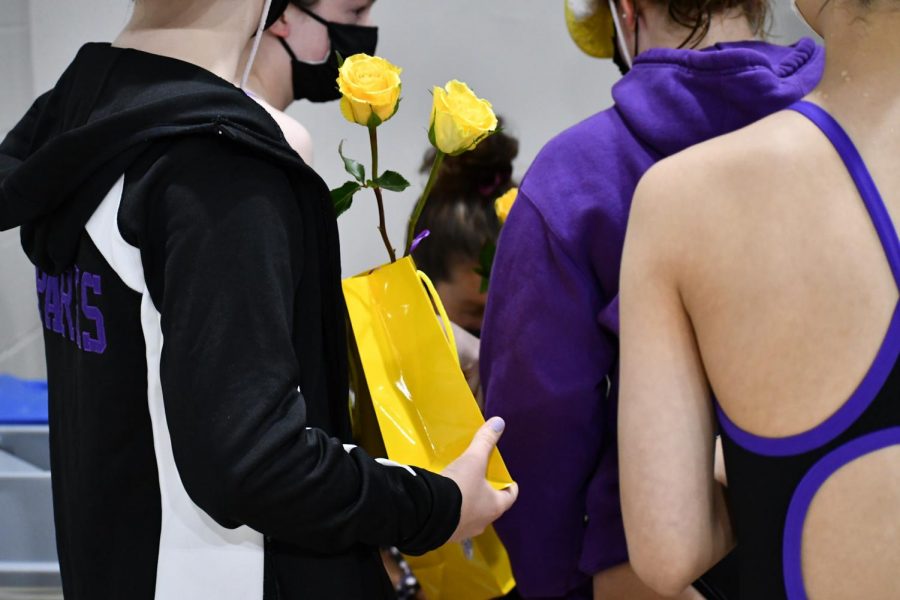 In honor of the seniors' last meet, SPARKS coach prepared small gifts and flowers for each of the seniors.
