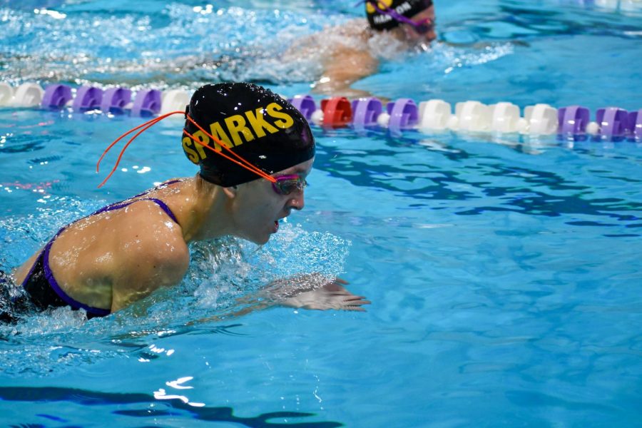 Senior Ellie Sandeen has a little over 50 yards left of her 200 IM left as she swims breaststroke to the wall. 