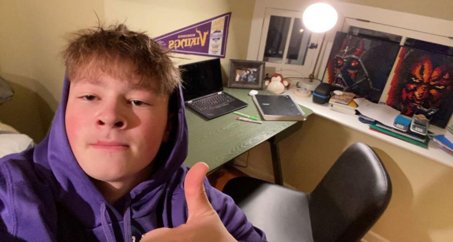 Reinhart's desk has things ranging from Star Wars posters, Minnesota Vikings banners, and so much more.