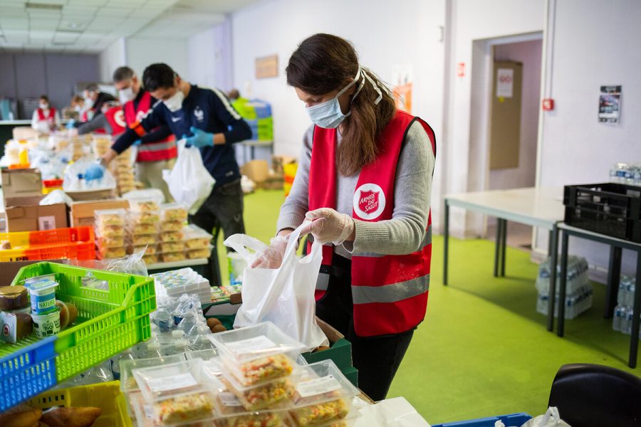 READY TO SEND OFF. A woman packs food for the Salvation Army.