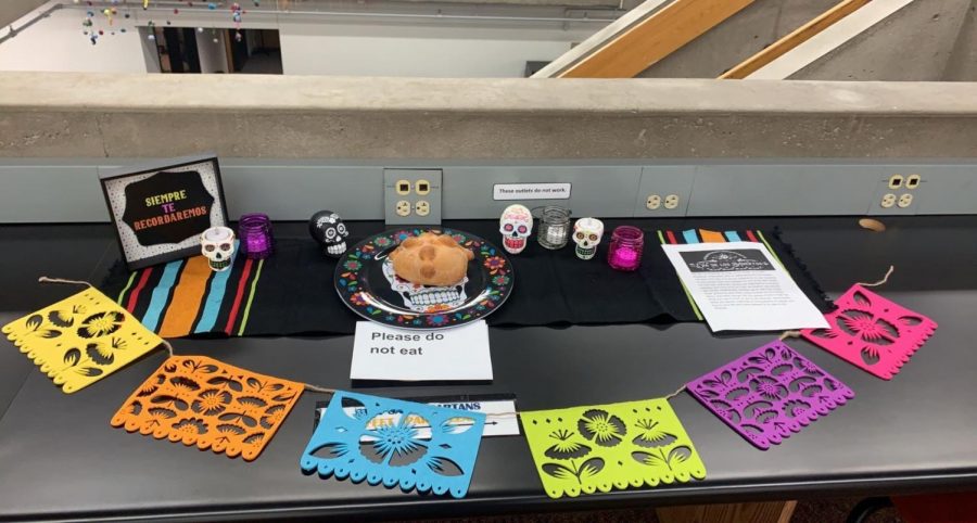 OUTSTANDING OFRENDA. To celebrate Día de Los Muertos, Latinos Unidos set up an elaborate and inviting ofrenda in the library for all students to admire and learn more about the history of the celebration. Leader of the group Maryeva Gonzalez took inspiration from her own family traditions. “I usually celebrate with my family, and we make an ofrenda in our house… we honor our family members who have passed away, she said.