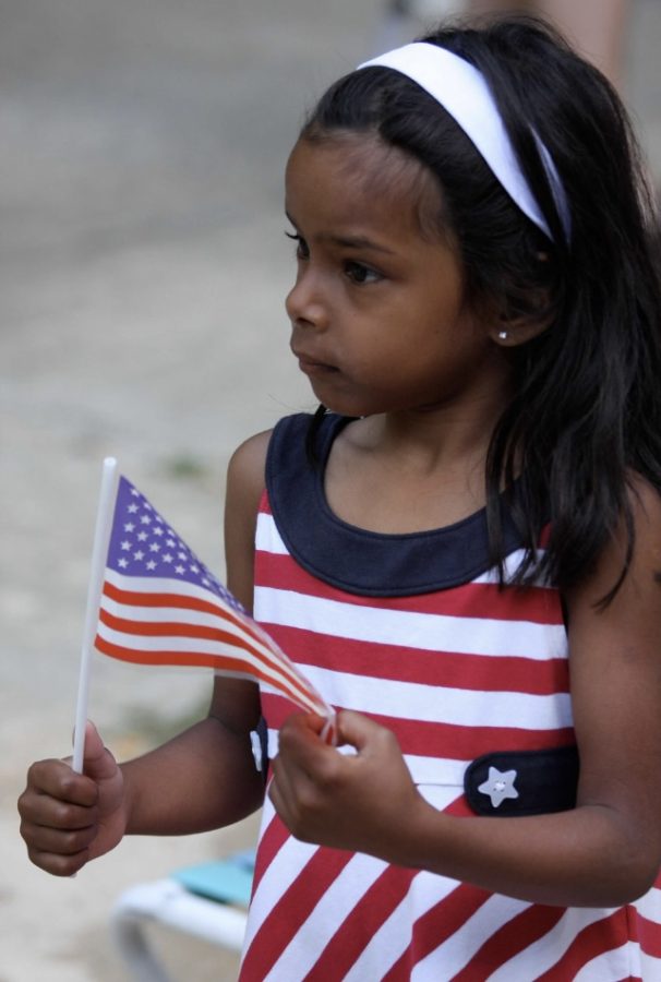 RED, WHITE, BLUE. After adoption, Shaughnessy celebrates her first Independence Day in the U.S. with her family. 