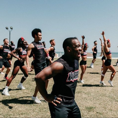 GO BULLDOGS. The Navarro cheerleaders put everything they have into practicing their routine on the shores of Daytona Beach. Only one obstacle is left to face: the championship.