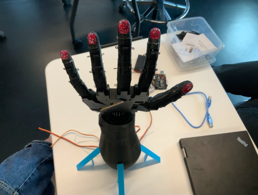 GIVE ME A HAND. After long hours and tons of work, the hand, in it's completed form, is ready to be displayed.