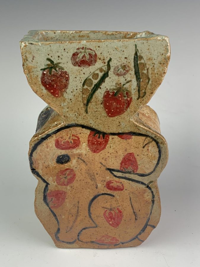 A MILLION MEMORIES. On one side of Waibel's award-winning slab vase, she incorporated a youthful baby bunny that reminds her of the vegetables and fruits she and her brother used to pick.