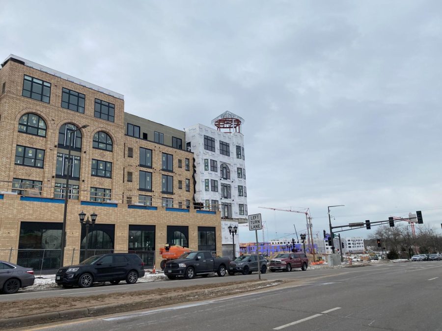 NEW URBANISM. Construction continues on the Highland Bridge neighborhood Mar. 3, eleven years after the
closing of the Ford Plant. Ryan Companies announced the
project in 2017. Lots and the first row homes went on sale
in late-February. 