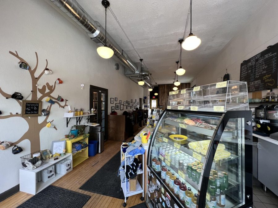 ROASTING BEANS. The first view one is greeted with when entering yellowbird coffee bar includes the mug tree.