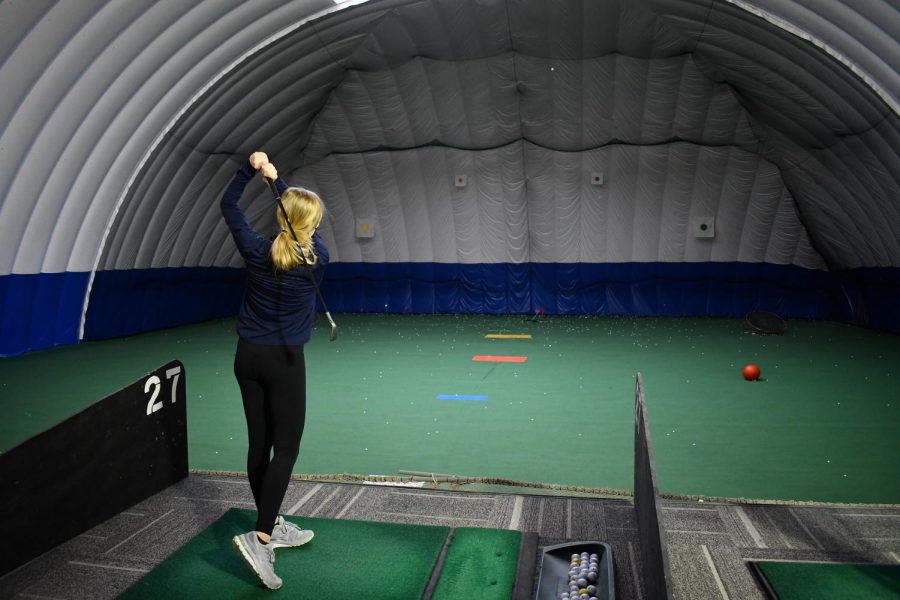 co-Captain Nikola Barkwell practices in the dome: "This year and last year have been especially difficult with transportation because we have many students who can not drive themselves."