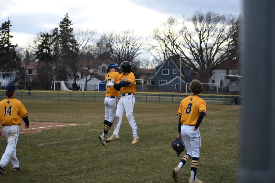 CELEBRATION: After someone gets past home plate the whole team irrupts in joy. 