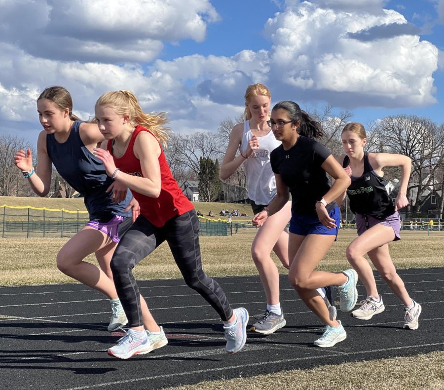 SPONTANEOUS SPRINTING: The sprinters prepare to take off and run the 200.