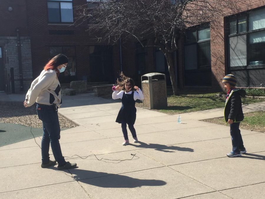 Senior Nan Besse works at the Adventure Kids program after school. "You just kind of talk to them and hang out and then their parents will come," Besse said.