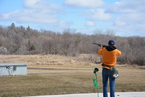 SHATTERED CLAY. Team captain Jack OBrien takes aim during a round of practice at the Minneapolis Gun Club.
