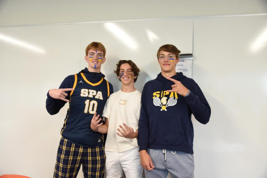 SPIRITED SQUAD. Juniors Tysen Hayes, Sam Zakaib and Leo Benson are bringing the school spirit. Hayes said, On Blue and Gold Day I feel great, because I get to represent my school and go to the soccer and football games.