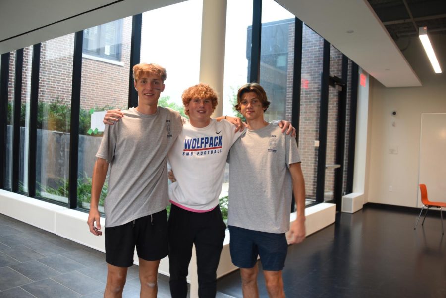 GAMEDAY GROOVE. Seniors Finn Sullivan and Joey Stoplestad along with junior Cooper Olson are fired up for the Friday soccer and football games. Sporting SPA athletics gear, Olson advertised, Everyone should go to the Boys Varsity Soccer game.