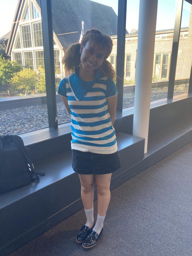 TIME MACHINE. Senior Milkii Tigro wears what she wore as a elementary schooler . "I wore this shirt in 5th grade and I used to wear flats a lot, and this skirt  gives off a youthful vibe."