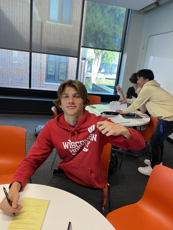 GO BADGERS. Junior Cooper Olsen has grown a love for the Wisconsin Badgers Hockey Team. I was really excited when I heard our color was red because I wanted to represent with my hoodie, Olsen said.