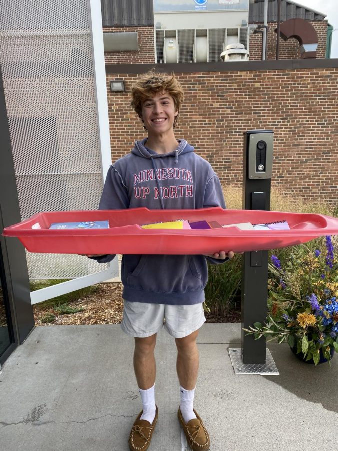 Senior Nathan Cohen lugged around his belongings on a red sled.