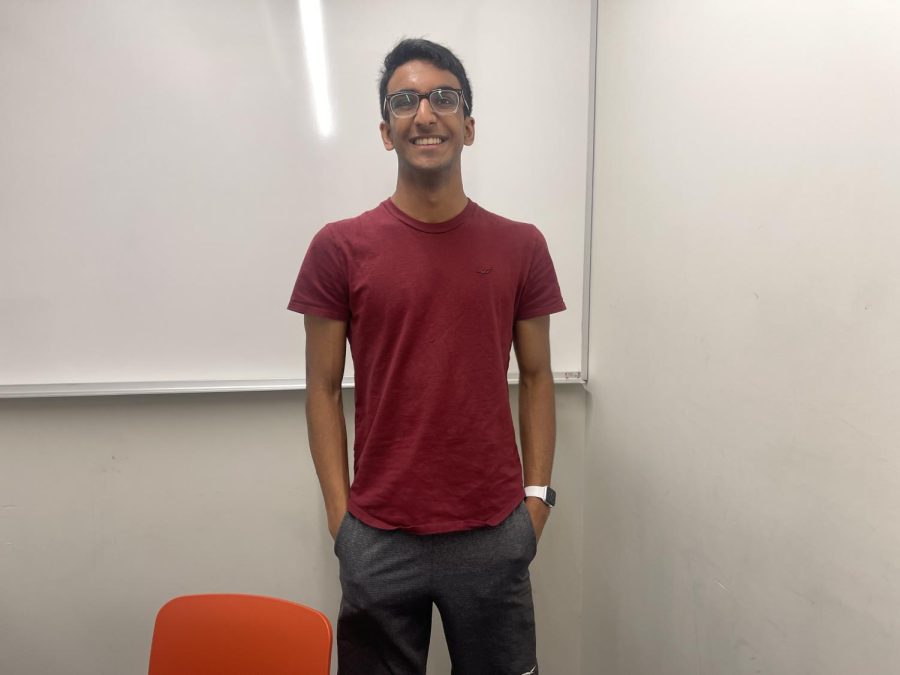 KEEPING IT REAL: Junior Rishi Bhargava admitted he chose this shirt due to the lack of options in his closet. I chose this shirt because it was the only red shirt I had, and it was class color day.