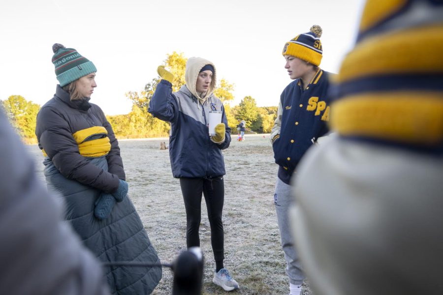 PEP TALK. Coach Sophie Schmitz gives the team a pep-talk and some last-minute pointers ahead of their intrasquad meet.