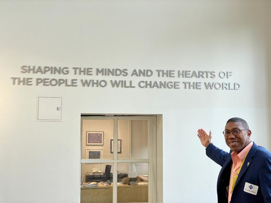 WRITING ON THE WALL. Every day, dozens of students walk past the mission statement on the wall outside Head of School Luis Ottley’s office. Ottley spoke about the significance of the statement at assembly on the first day of school. Ottley said, “...I thought it might be sort of good for people to know why I’m here.”  