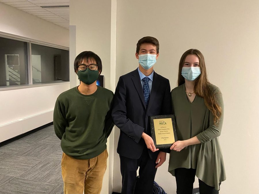 Maya Sachs and Henry Choi (shown with former debate coach Vincent Chen) have been debate partners since the start of the 2020 debate season. "I was watching the final rounds of nationals, and afterwards when they gave awards, there's like two girls standing on the stage of like, 20 people and it and it's a bummer, because, for example, like we are no less capable and no less successful than boys in debate. But there are a lot of biases that prevent success," she said.