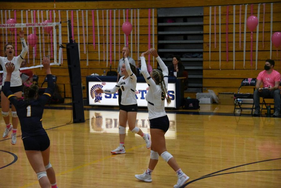 The Spartans Celebrate a point, trying to rally back against the Redhawks.