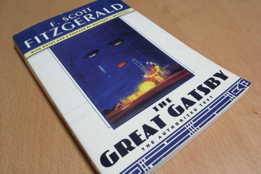 GREEN LIGHT. RED LIGHT. The Great Gatsby by F. Scott Fitzgerald has been part of the sophomore English curriculum for so long that no one knows when it was added. Still, it was removed this year from the reading list. Anne Boemler, 10th-grade English teacher and fellow member of the group who set the booklist, had a few of the grounds in mind: “We were concerned about the antisemitism in the novel; we wanted students to read texts by a more diverse collection of authors; and (you guessed it) we were indeed feeling tired of reading a hundred essays on the green light every year.”