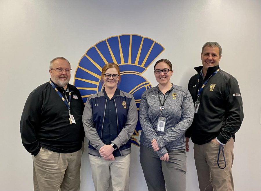 DEDICATED DEPARTMENT. The athletic administrative team consists of Interim K-12 Athletic Director Rick Johns, MS Athletic Director Taylor Tvedt, Athletic Administrative Assistant Hope Walcheski and US Athletic Director Randy Comfort.