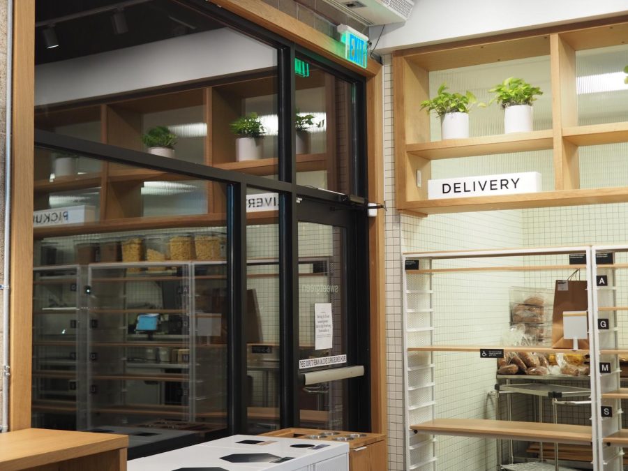 ONLINE OR IRL. While orders can be placed in store with an employee, guests can also place orders ahead of time online or through the Sweetgreen app to expedite the process of receiving their food. An entire floor-to-ceiling shelf is designated for these online orders.