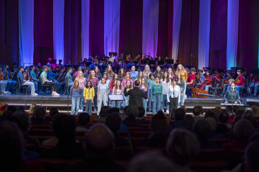 FOCUS. Choir director, Tim Kraack is locked in as he directs Summit Singers. 