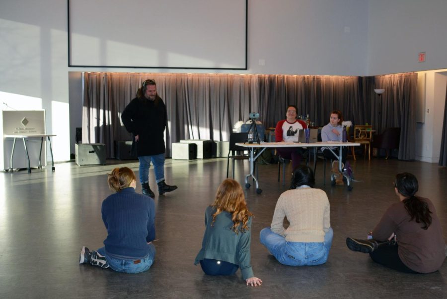 HERE WE GO. Theater Director Eric Severson talks to hopefuls during Auditions Dec. 3-4 to start off the process.