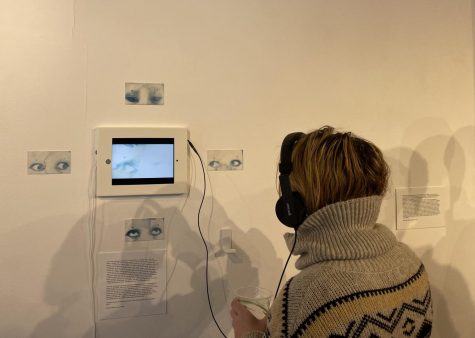 INTERACTIVE ABSTRACTION: Senior Quenby Wilson’s contribution to the exhibit is meant to be an immersive experience for viewers, with headphones and a video screen. 