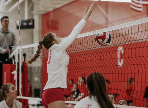 BIG BLOCK. Senior Solvej Eversoll jumps and blocks a serve from the opposing team. Eversoll plays for the Northern Lights volleyball club when the high-school season is not in session.