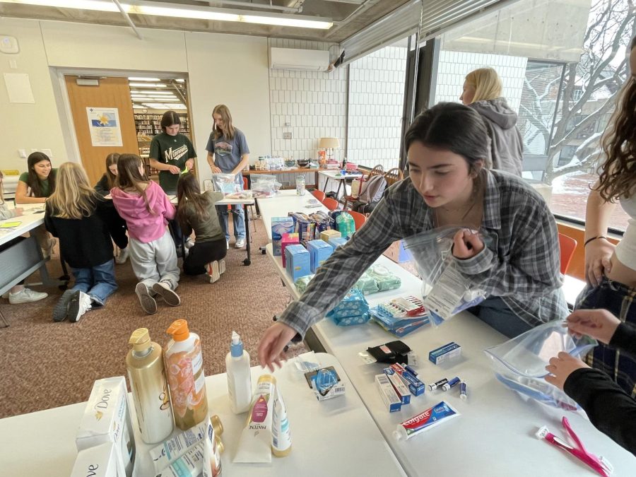 LEND A HAND.  In Minnesota, 7,000 individuals face homelessness, and over 22 million people in the United States face period poverty. HerSpaces focus on outreach made these issues the central focus of their January drive. HerSpace members got together to assemble hygiene care packages during tutorial on Friday. 