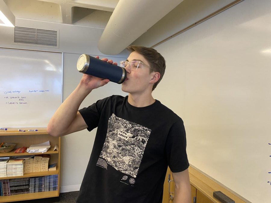 GULP. Junior Leo Benson sips on his favorite water bottle during the school day.