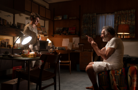 "YOU TALK TOO MUCH." Sammy Fabelman (left, Gabriel Labelle) is trapped in his room and has no choice but to listen as uncle Boris (right, Judd Hirsch) gives him a speech on art. 