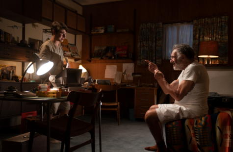 YOU TALK TOO MUCH. Sammy Fabelman (left, Gabriel Labelle) is trapped in his room and has no choice but to listen as uncle Boris (right, Judd Hirsch) gives him a speech on art. 