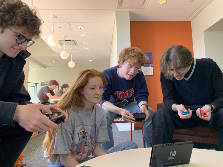 BONDING Juniors bring a nintendo switch to play multiplayer games during their free period. "Some of our friend have advisory up here so we just naturally come up here," Zimmerman said.
