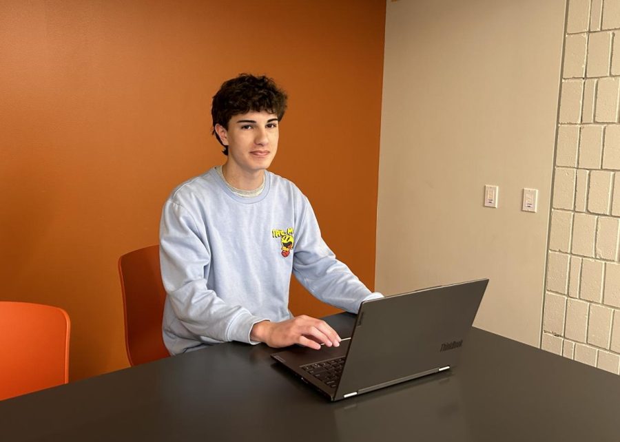 TWO BIRDS, ONE STONE. Sophomore Lucas Granja uses the language commons as both a study and a social space. "It's usually quiet and...sometimes my friends are here," he said.