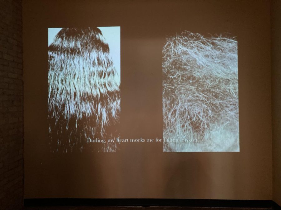 HAIR. "Mirror and Window" by Katayoun Amajadi presents the only visual and auditory piece depicting the weight of hair and femininity. 